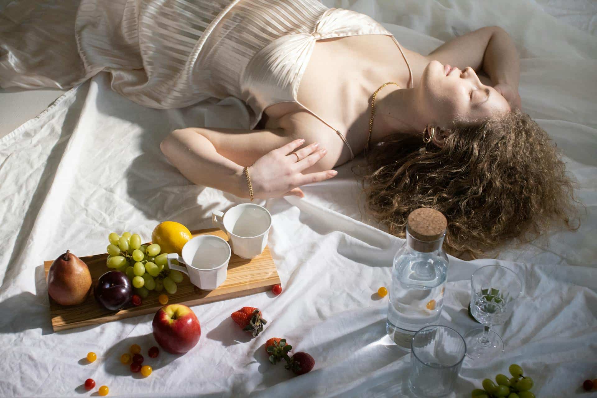 Woman enjoying a nutritious meal with fruits and vegetables